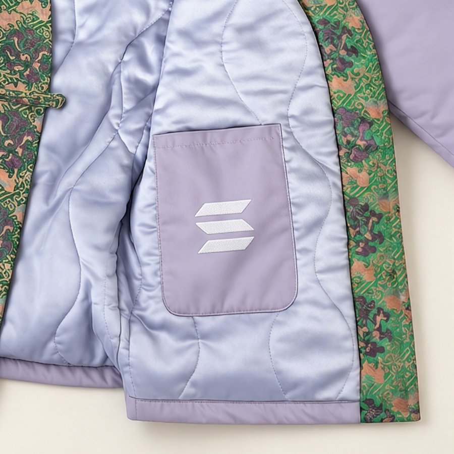 Patterned quilt lining and inner pocket